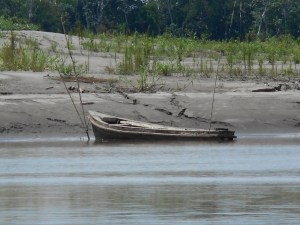 Amazon- bailing his little boat....