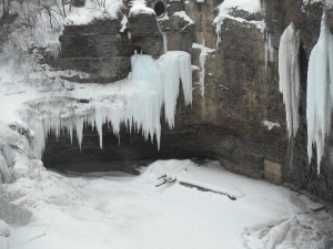 students  view the frozen falls on their way to class...