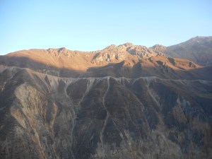 as the sun rises the shadow comes out of the canyon