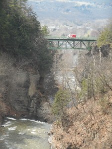 red truck crossing a chasm of time
