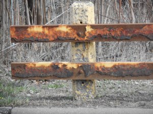 rusting on the roadside guardrail 