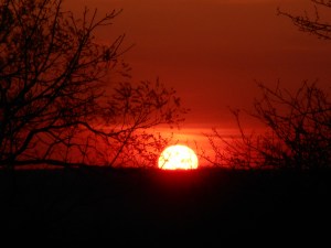 setting sun standing there watching it slip away...