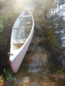 canoe filled with rain and sky...