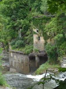 Van Natta's dam water flowing by  the old hydro plant...
