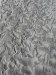the way water comes and goes on the beach