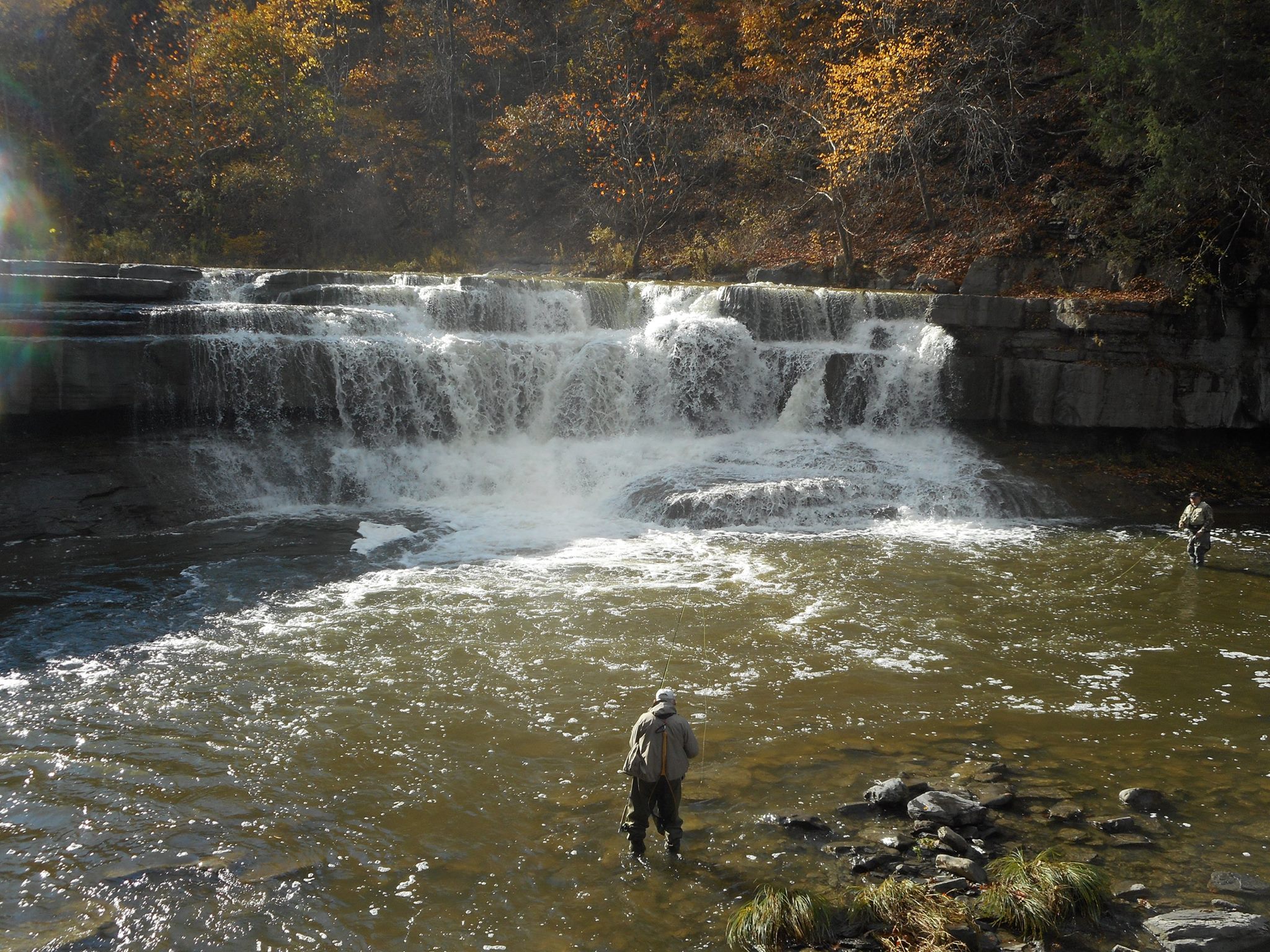 the day's catch... just below the falls a fisherman.jpg